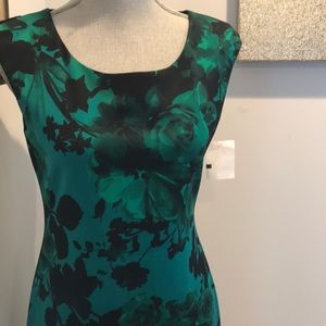 Modern Green dress. A little above ankle length.